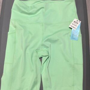 Ideology Women High Rise Side Pockets 10" Biker Shorts, Pistachio Green Medium